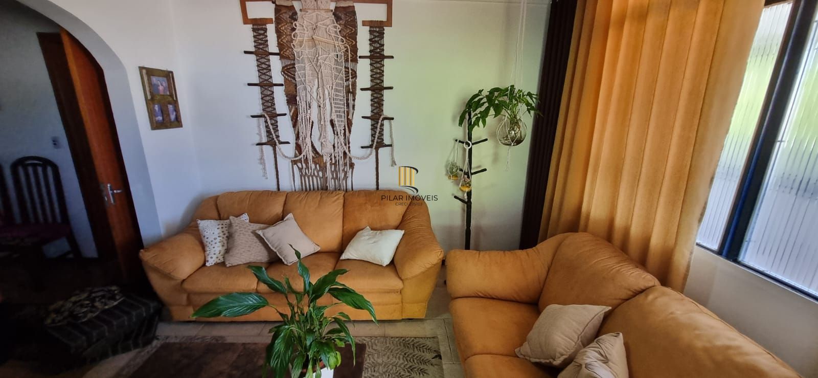 Casa com pavilhão