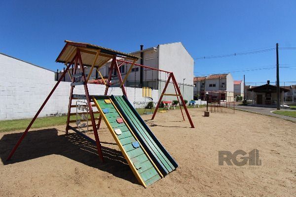 Casa Condominio em Porto Alegre, no bairro Hípica, com 3 dormitório(s), e 3 banheiros, à venda.