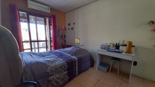Casa em Porto Alegre, no bairro Hípica, com 3 dormitório(s), à venda.