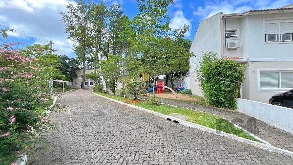 Casa Condominio em Porto Alegre, no bairro Hípica, com 3 dormitório(s), e 3 banheiros, à venda.