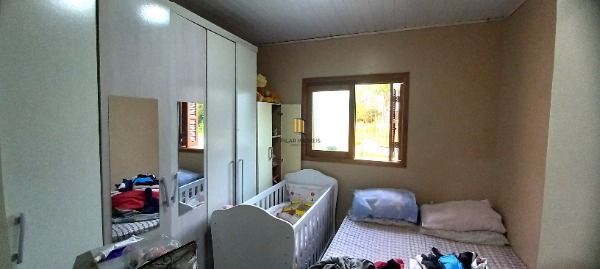 Casa em Porto Alegre, no bairro Ponta Grossa, com 2 dormitório(s), e 2 banheiros, à venda.