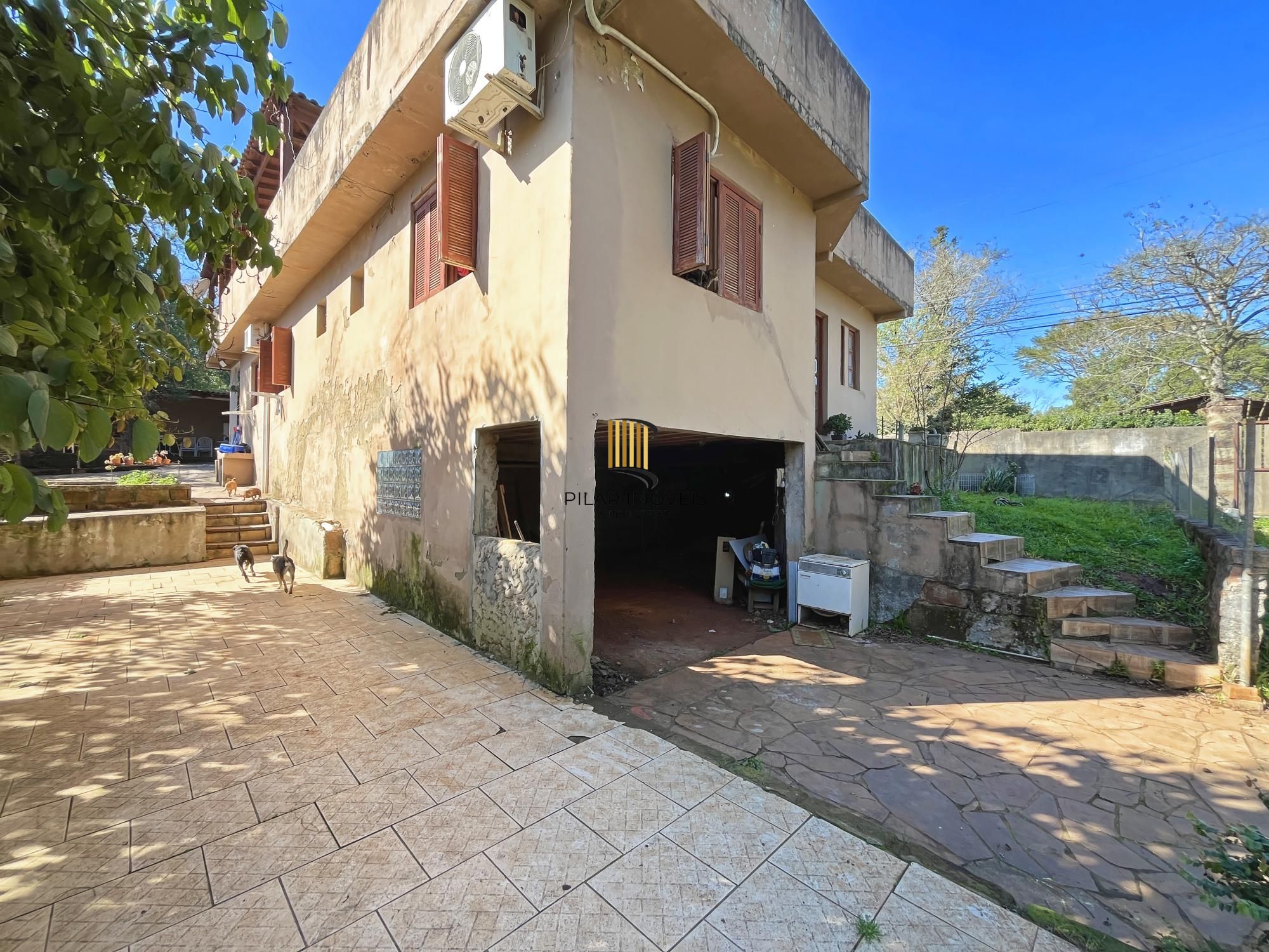 Casa 3 dormitórios no bairro Hípica