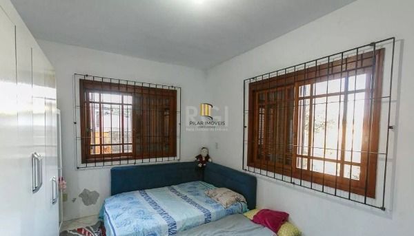 Casa em Porto Alegre, no bairro Cavalhada, com 5 dormitório(s), e 5 banheiros, à venda.