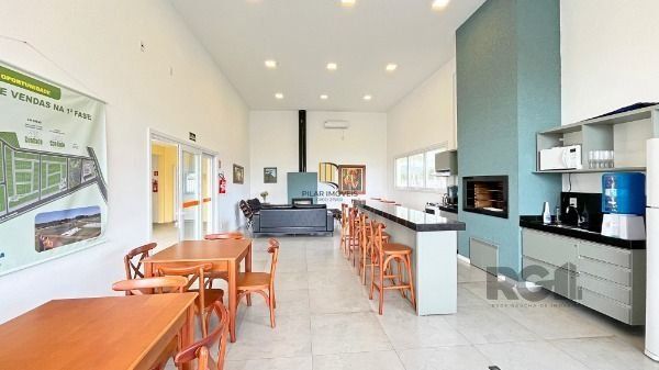 Casa Condominio em Porto Alegre, no bairro Hípica, com 3 dormitório(s), e 3 banheiros, à venda.