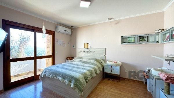 Casa em Porto Alegre, no bairro Espirito Santo, com 3 dormitório(s), e 3 banheiros, à venda.