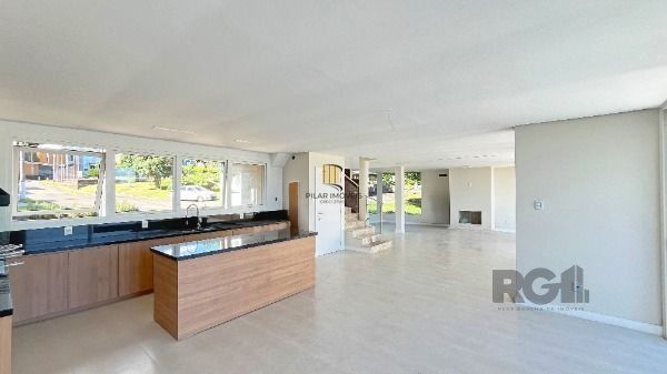 Casa Condominio em Porto Alegre, no bairro Hípica, com 3 dormitório(s), e 3 banheiros, à venda.