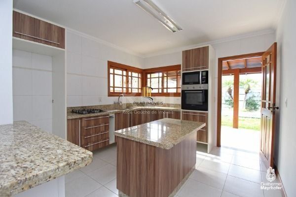 Casa de Condomínio 3 dormitórios no bairro Hípica