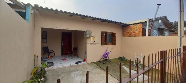 Casa em Porto Alegre, no bairro Ponta Grossa, com 2 dormitório(s), e 2 banheiros, à venda. - Pilar Imóveis