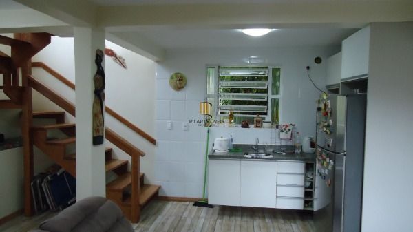 Sítio em Porto Alegre, no bairro Hípica, com 2 dormitório(s), e 2 banheiros, à venda.
