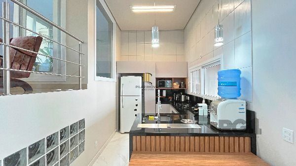 Casa em Porto Alegre, no bairro Hípica, com 3 dormitório(s), e 3 banheiros, à venda.