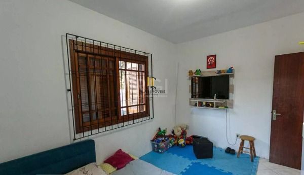 Casa em Porto Alegre, no bairro Cavalhada, com 5 dormitório(s), e 5 banheiros, à venda.
