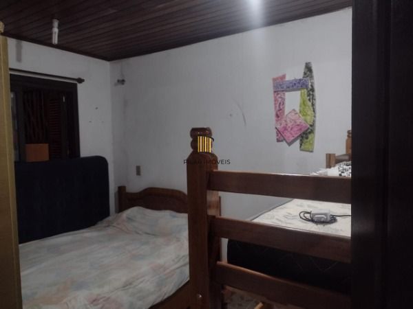 Casa 5 dormitórios no bairro Zona Norte