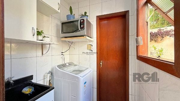 Casa Condominio em Porto Alegre, no bairro Ipanema, com 3 dormitório(s), e 3 banheiros, à venda.