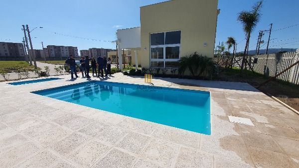 Casa Condominio em Porto Alegre, no bairro Hípica, com 3 dormitório(s), e 3 banheiros, à venda.