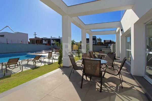 Casa Condominio em Porto Alegre, no bairro Ipanema, com 3 dormitório(s), à venda.