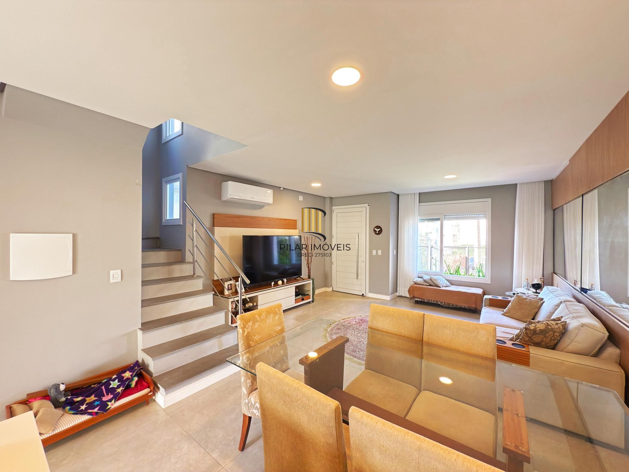 Casa moderna com 3 dormitórios com pátio grande e vista para o Rio Guaíba!