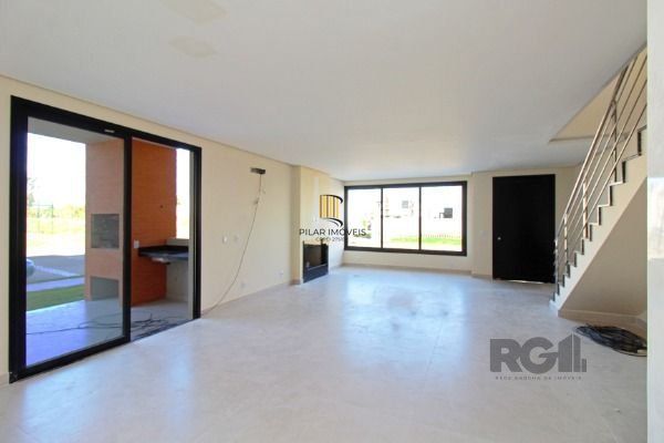 Casa em Porto Alegre, no bairro Hípica, com 3 dormitório(s), e 3 banheiros, à venda.