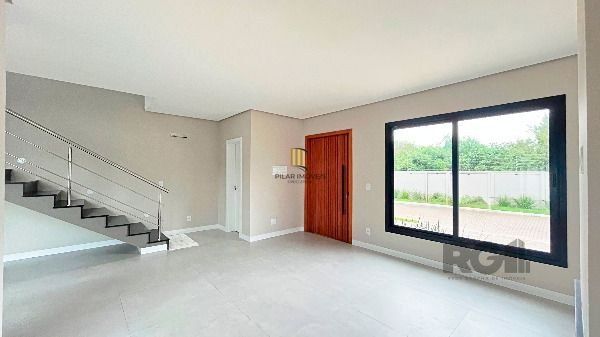 Casa Condominio em Porto Alegre, no bairro Hípica, com 3 dormitório(s), e 3 banheiros, à venda.