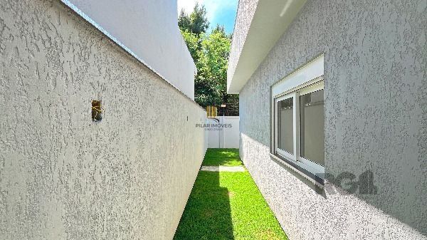 Casa Condominio em Porto Alegre, no bairro Hípica, com 3 dormitório(s), e 3 banheiros, à venda.