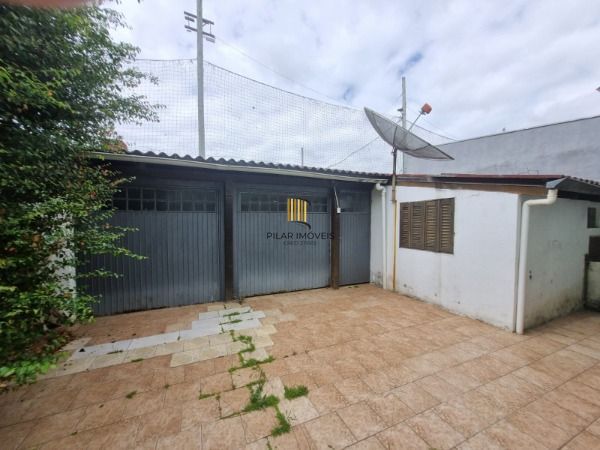 Casa 4 dormitórios no bairro Camaquã