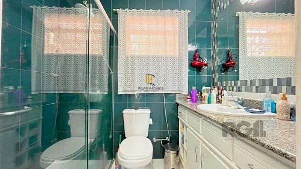 Casa Condominio em Porto Alegre, no bairro Santa Tereza, com 3 dormitório(s), e 3 banheiros, à venda.