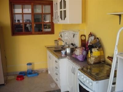 Residência com 4 dormitórios sendo 1 suites no Bairro Guarujá.
