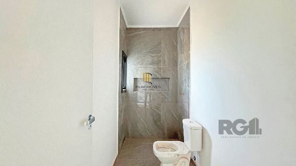Casa em Porto Alegre, no bairro Hípica, com 3 dormitório(s), e 3 banheiros, à venda.