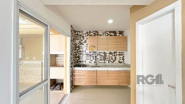 Casa Condominio em Porto Alegre, no bairro Ipanema, com 3 dormitório(s), e 3 banheiros, à venda.