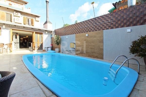 Casa em Porto Alegre, no bairro Ipanema, com 4 dormitório(s), e 4 banheiros, à venda. - Pilar Imóveis