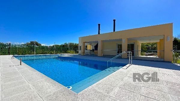 Casa Condominio em Porto Alegre, no bairro Hípica, com 3 dormitório(s), e 3 banheiros, à venda.