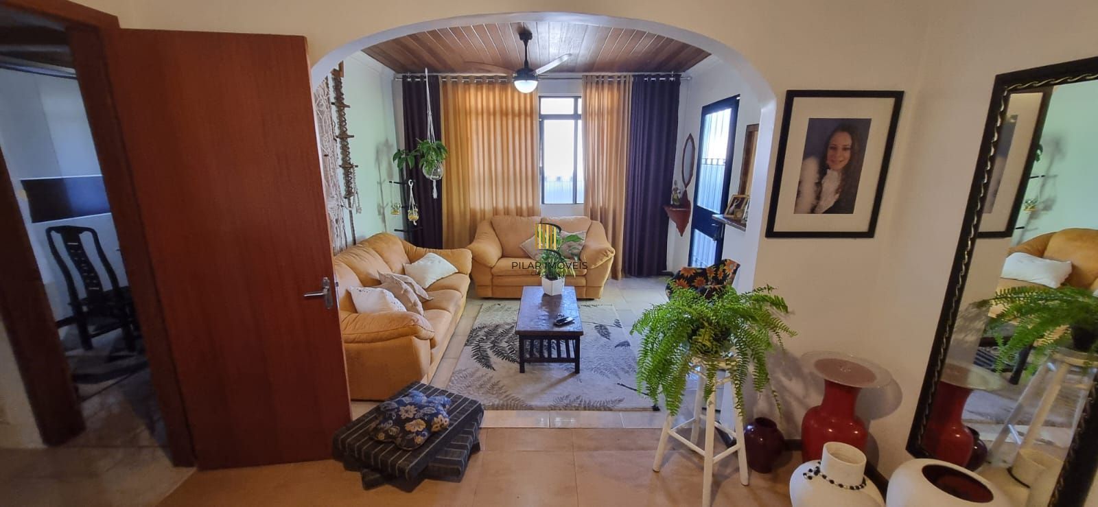 Casa com pavilhão