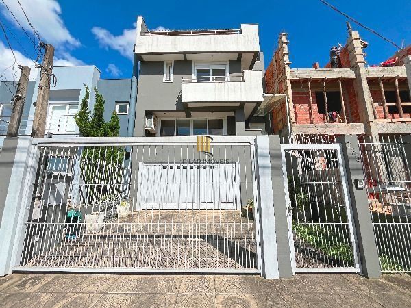 Casa em Porto Alegre, no bairro Hípica, com 3 dormitório(s), e 3 banheiros, à venda. - Pilar Imóveis