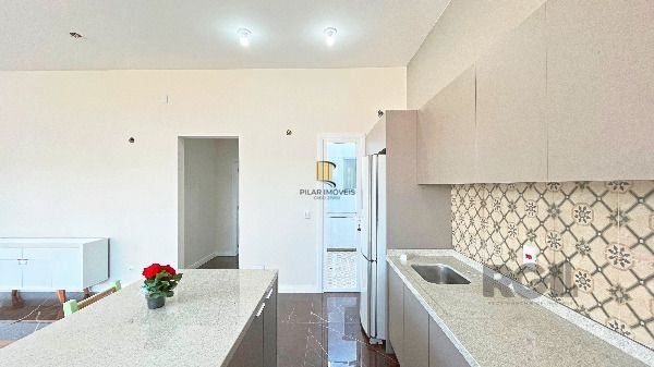Casa Condominio em Porto Alegre, no bairro Hípica, com 3 dormitório(s), e 3 banheiros, à venda.