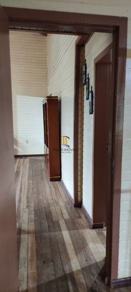 Casa em Porto Alegre, no bairro Campo Novo, com 3 dormitório(s), e 3 banheiros, à venda.