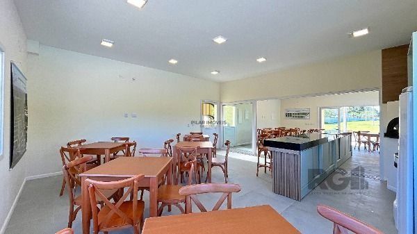 Casa Condominio em Porto Alegre, no bairro Hípica, com 3 dormitório(s), e 3 banheiros, à venda.