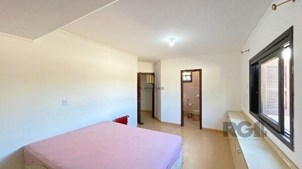 Casa 4 dormitórios no bairro Camaquã