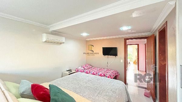 Casa em Porto Alegre, no bairro Hípica, com 3 dormitório(s), e 3 banheiros, à venda.