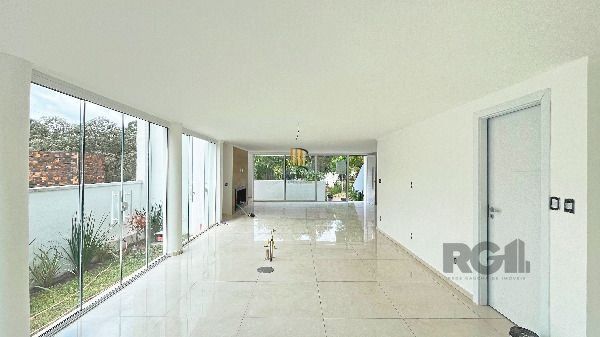 Casa Condominio em Porto Alegre, no bairro Hípica, com 3 dormitório(s), à venda.