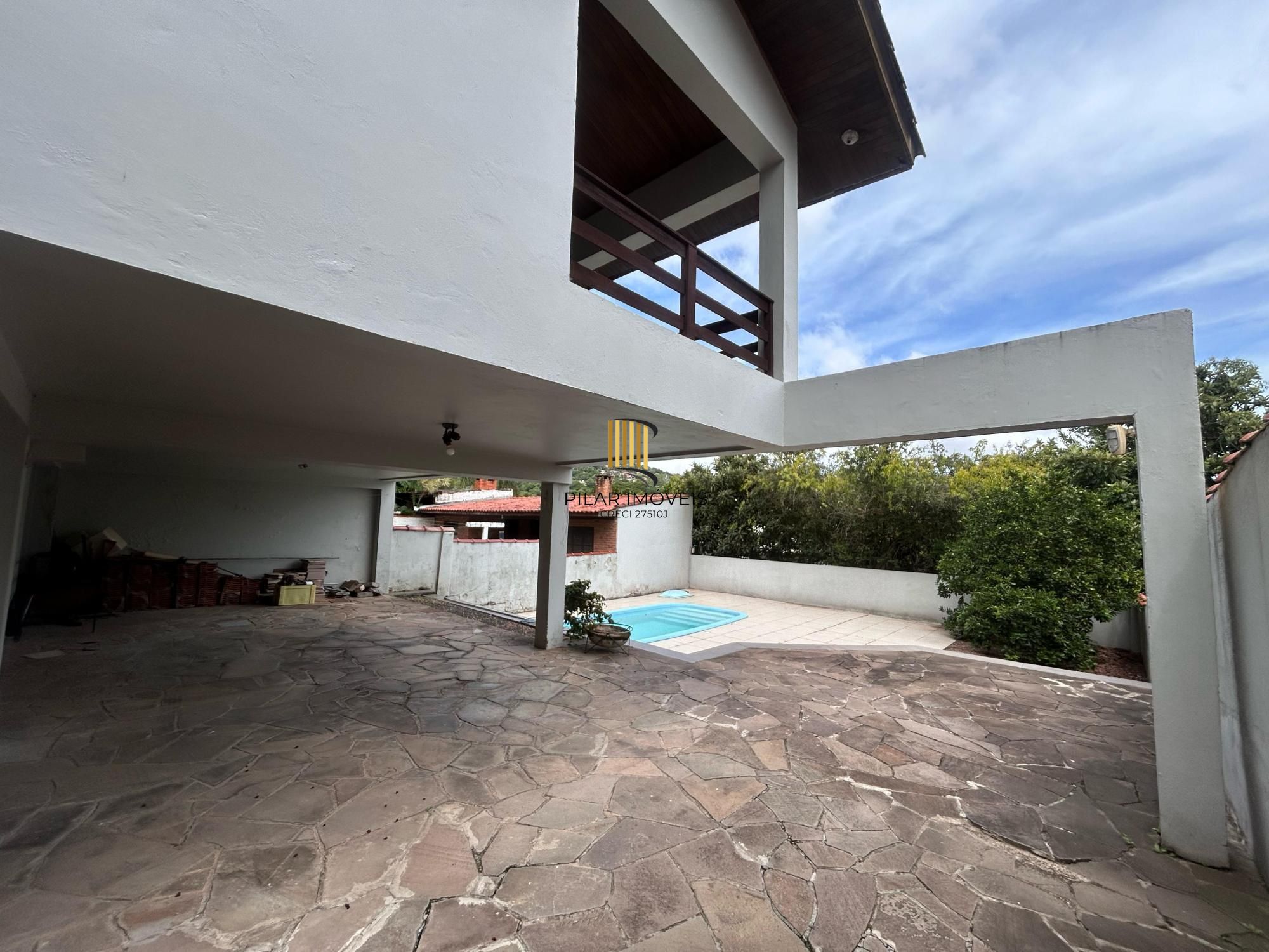 Casa 3 dormitórios no bairro Partenon
