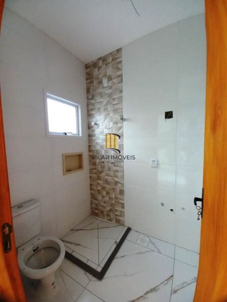 Casa em Porto Alegre, no bairro Belém Novo, com 3 dormitório(s), e 3 banheiros, à venda.