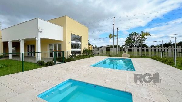 Casa Condominio em Porto Alegre, no bairro Hípica, com 3 dormitório(s), e 3 banheiros, à venda.