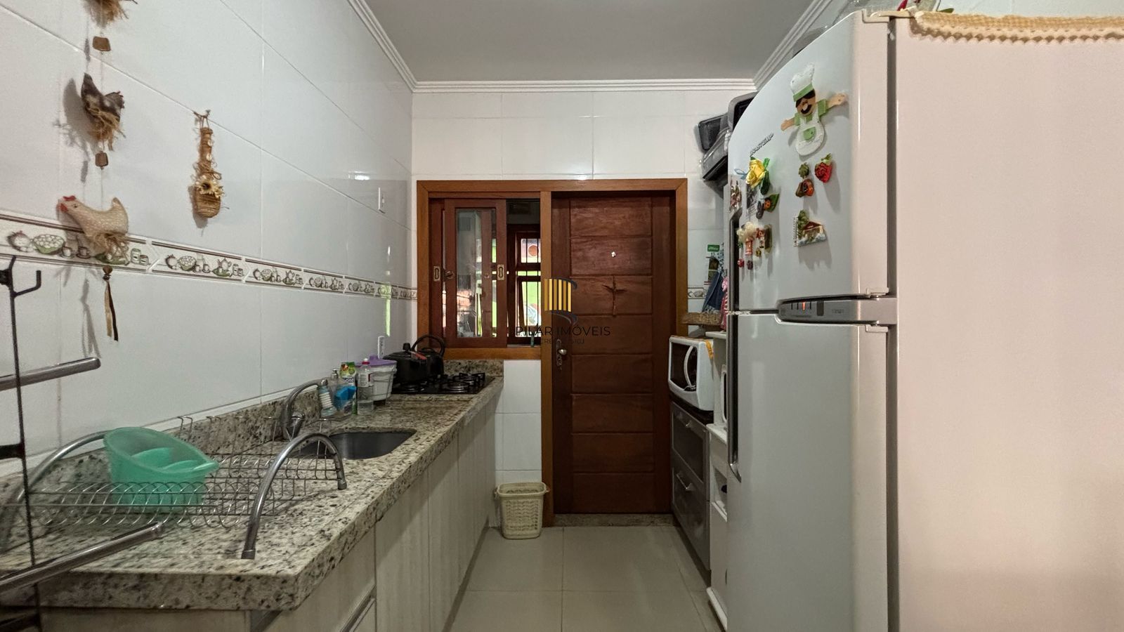 Casa 3 dormitórios no bairro Guarujá