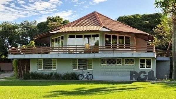 Casa Condominio em Porto Alegre, no bairro Cavalhada, com 4 dormitório(s), e 4 banheiros, à venda.