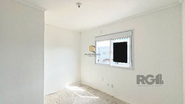 Casa em Porto Alegre, no bairro Vila Nova, com 2 dormitório(s), e 2 banheiros, à venda.