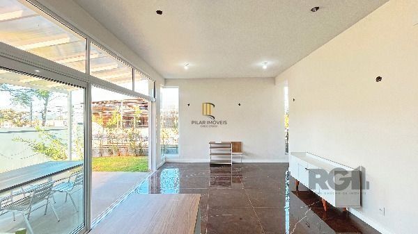 Casa Condominio em Porto Alegre, no bairro Hípica, com 3 dormitório(s), e 3 banheiros, à venda.