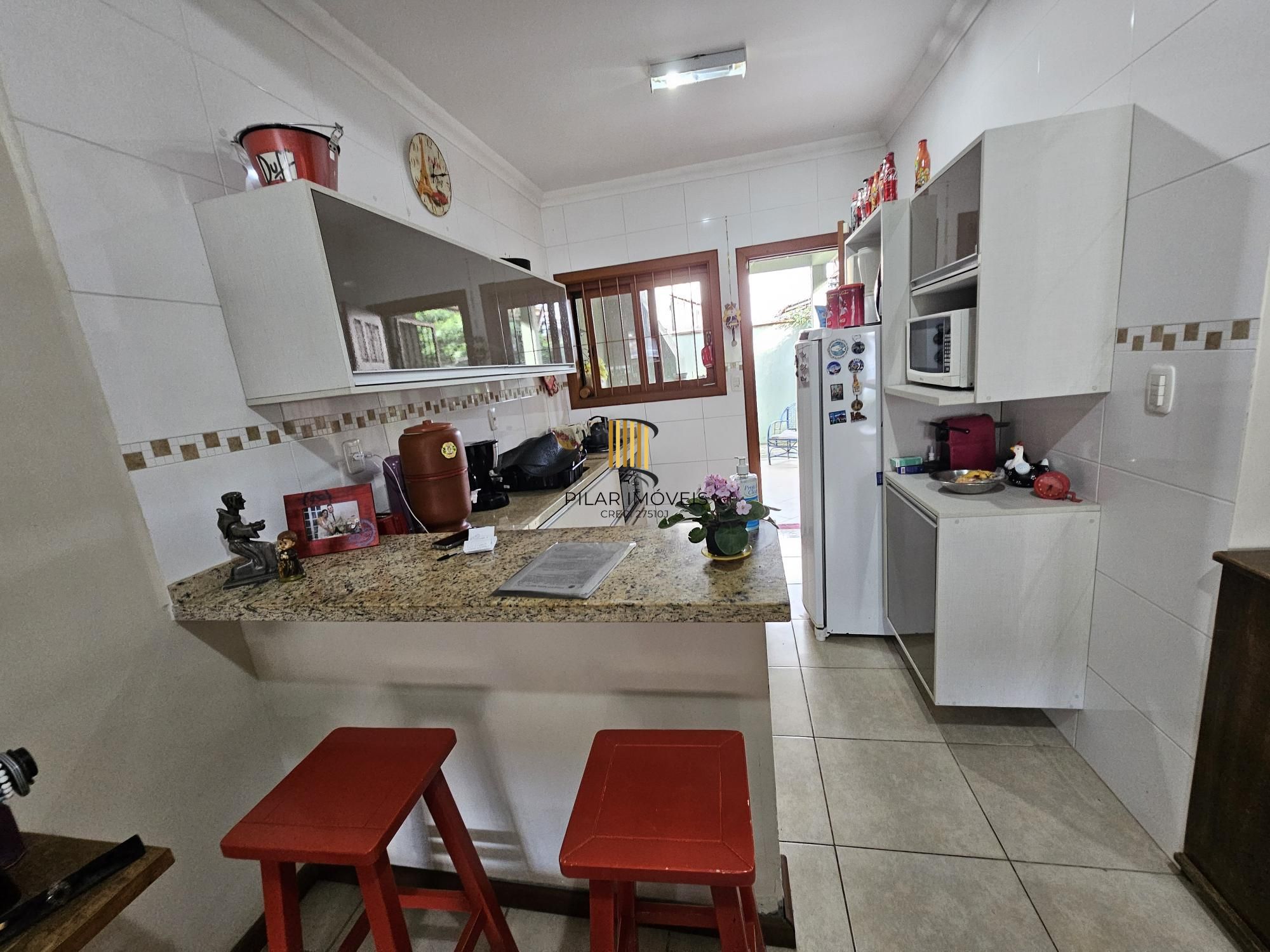 Casa 3 dormitórios no bairro Guarujá