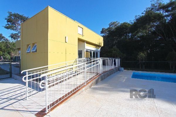Casa Condominio em Porto Alegre, no bairro Campo Novo, com 3 dormitório(s), e 3 banheiros, à venda.