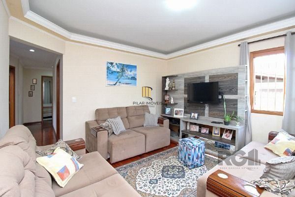 Casa em Porto Alegre, no bairro Belém Novo, com 3 dormitório(s), e 3 banheiros, à venda.