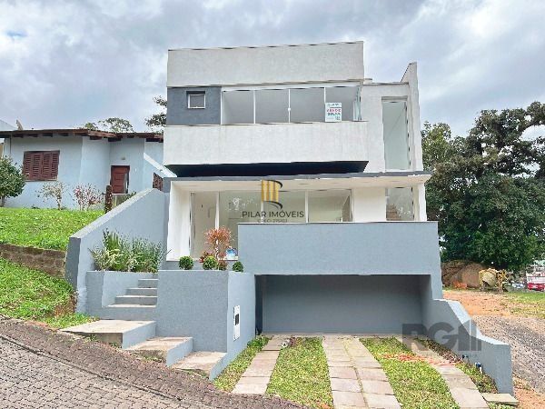 Casa Condominio em Porto Alegre, no bairro Hípica, com 3 dormitório(s), à venda. - Pilar Imóveis