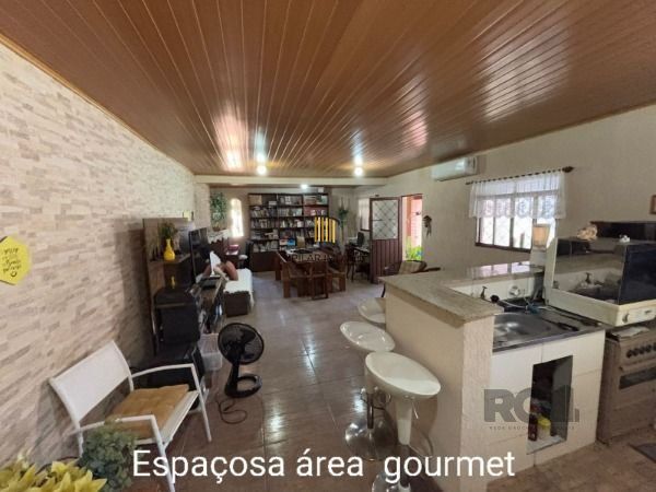 Casa 3 dormitórios no bairro Camaquã